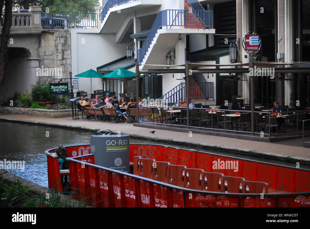 A gondola in front of a restaurant on the Riverwalk in San Antonio,Texas Stock Photo