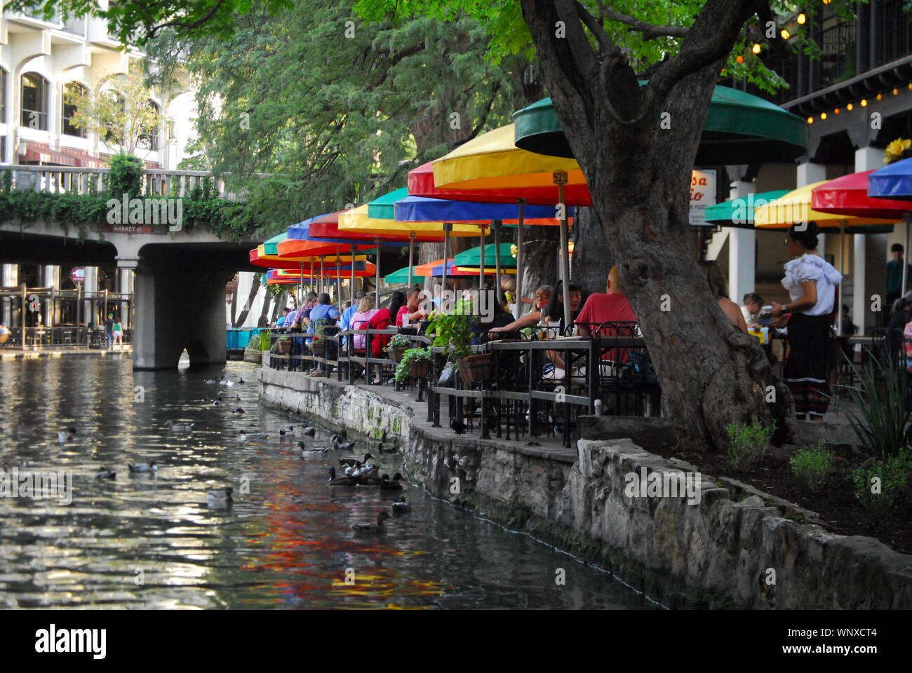 An outdoor restaurant beside the Riverwalk in San Antonio,Texas. Stock Photo