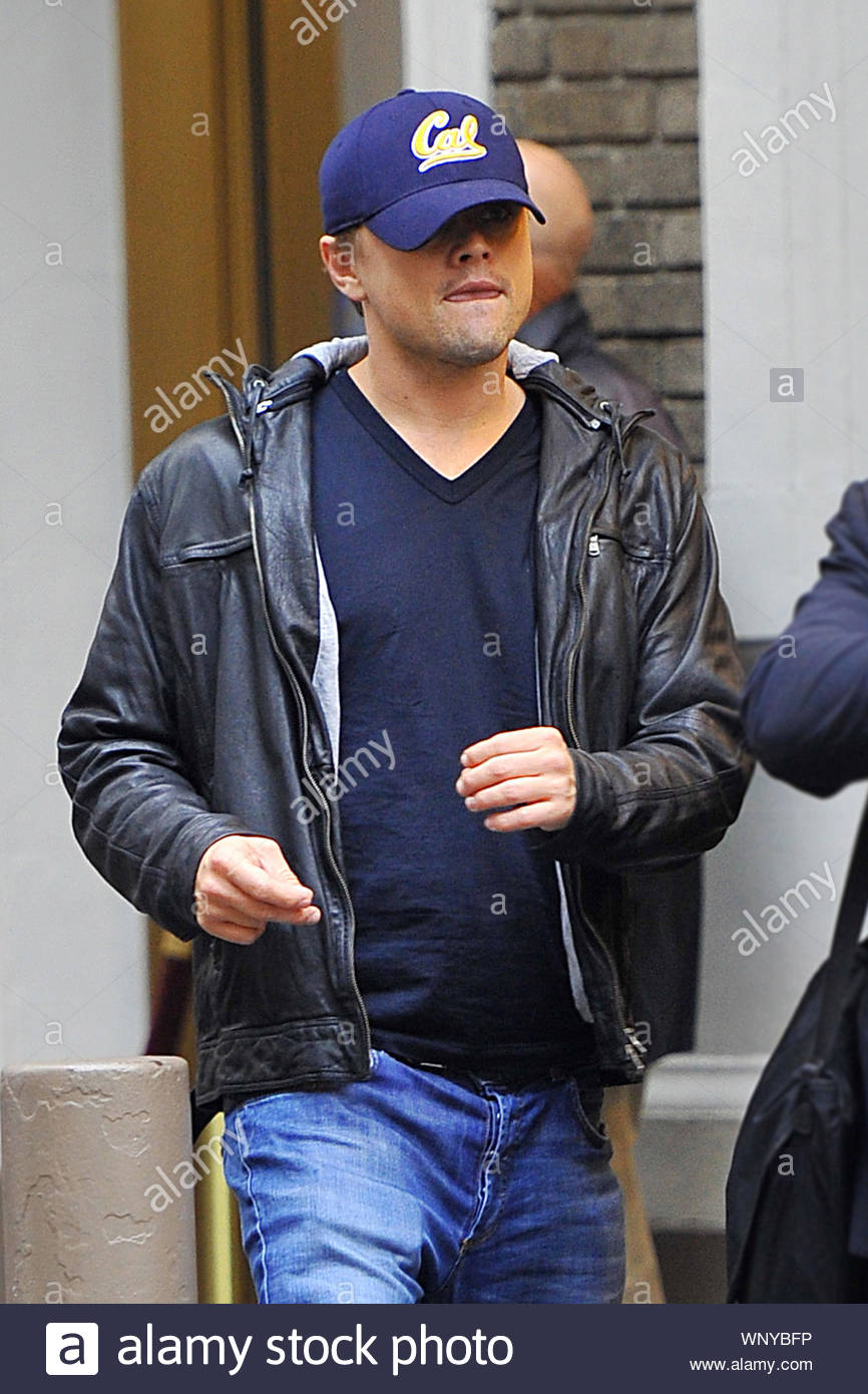 New York, NY - Leonardo DiCaprio keeps his baseball cap pulled down low as  he heads in
