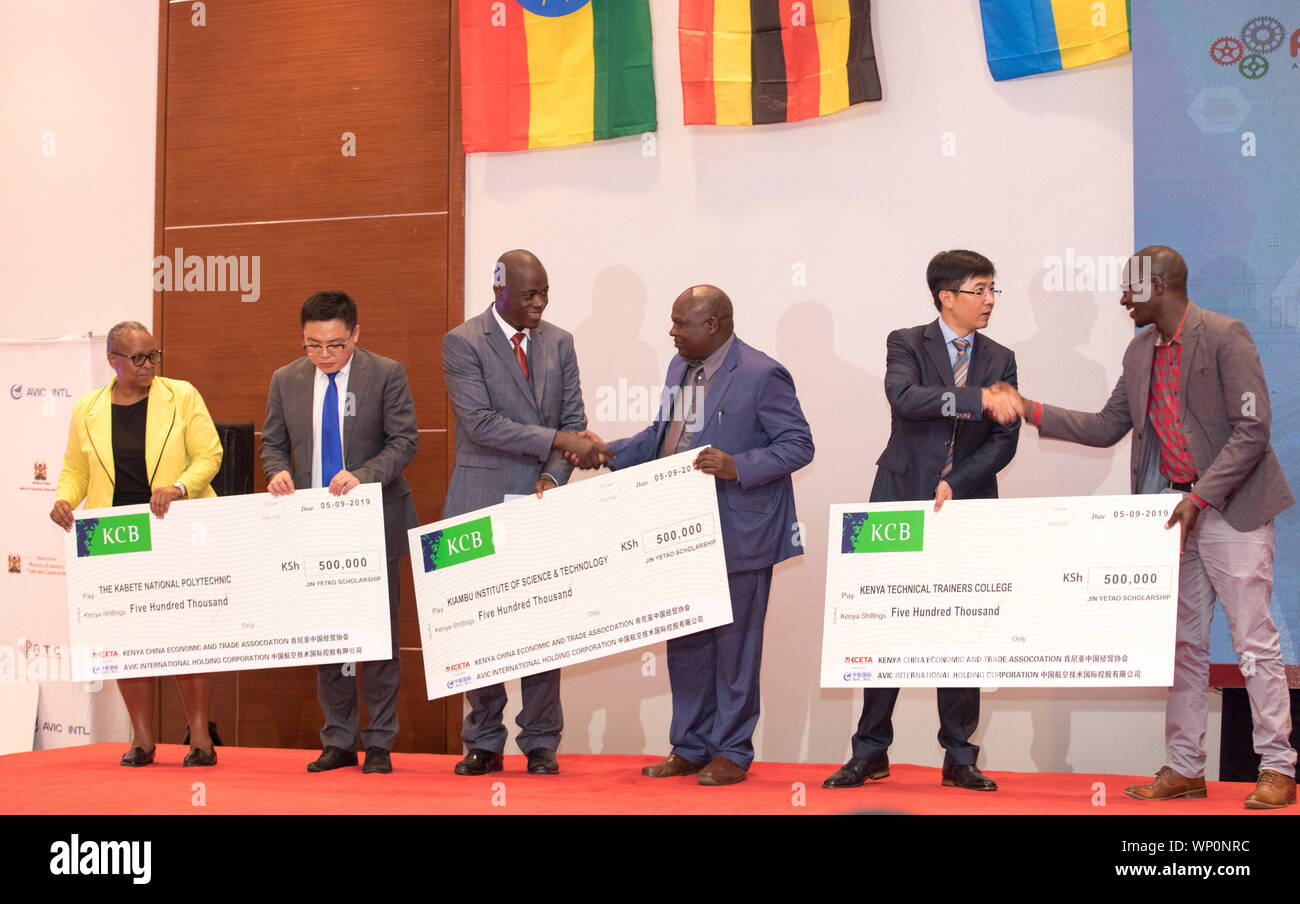(190907) -- NAIROBI, Sept. 7, 2019 (Xinhua) -- Jin Yetao Scholarship is issued at the closing ceremony of the sixth edition of the Africa Tech Challenge (ATC) in Nairobi, Kenya, on Sept. 5, 2019. The sixth edition of the Africa Tech Challenge (ATC) was held in Nairobi and drew participants from across eight African countries. All 48 students and 16 advisors have shown dedication to the five-week CNC (Computer Numerical Control) Lathe training and had a fierce two-day CNC Lathe contest. Fifteen Kenyan technical training students have won scholarships amounting to 1.5 million shillings (15,000 U Stock Photo