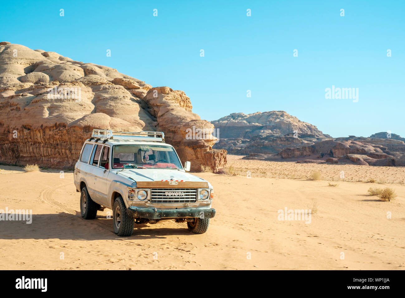 Jordan, Aqaba Governorate, Wadi Rum. Wadi Rum Protected Area, UNESCO World Heritage Site. A four wheel drive truck belonging to a local bedouin guide, Stock Photo