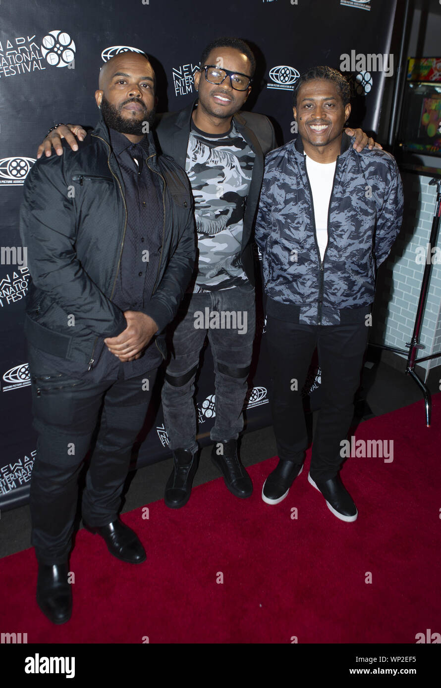 Newark, New Jersey, USA. 6th Sep, 2019. Left, actors and brothers LAHMARD TATE, LARENZ TATE, and LARRON TATE appear during the red carpet event for 'Business Ethics'' premiere at Newark Cineplex 12 during the fourth annual Newark International in Newark, New Jersey. The festival runs from September 4th and ends September 9, 2019 with an awards ceremony at the Newark Museum. Credit: Brian Branch Price/ZUMA Wire/Alamy Live News Stock Photo