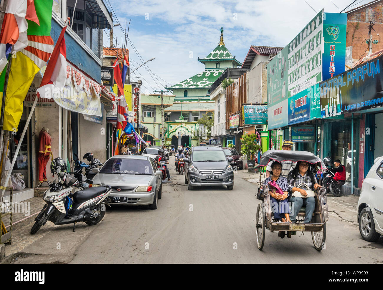 Jalan Kauman in Semarang Chinatown with view of the Semarang Central Mosque, Central Java, Indonesia Stock Photo