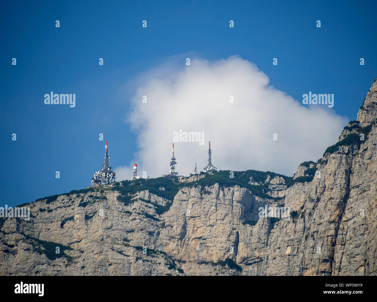 Radio telecommunications masts, towers on mountain top in th Dolomites, South Tyrol, Italy. Stock Photo