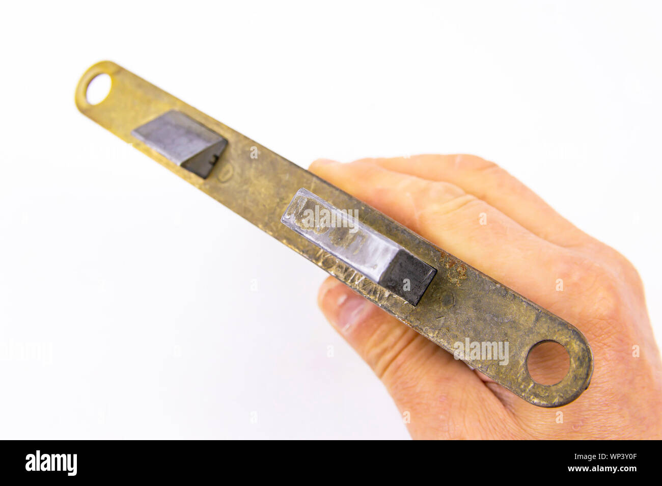 Disassembled door lock isolated against white background. Place for ...