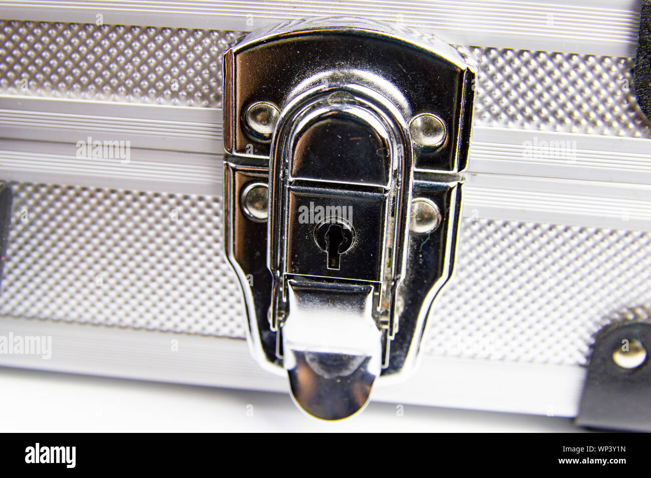 Aluminum case for a working tool on a white background, free space for dext Stock Photo