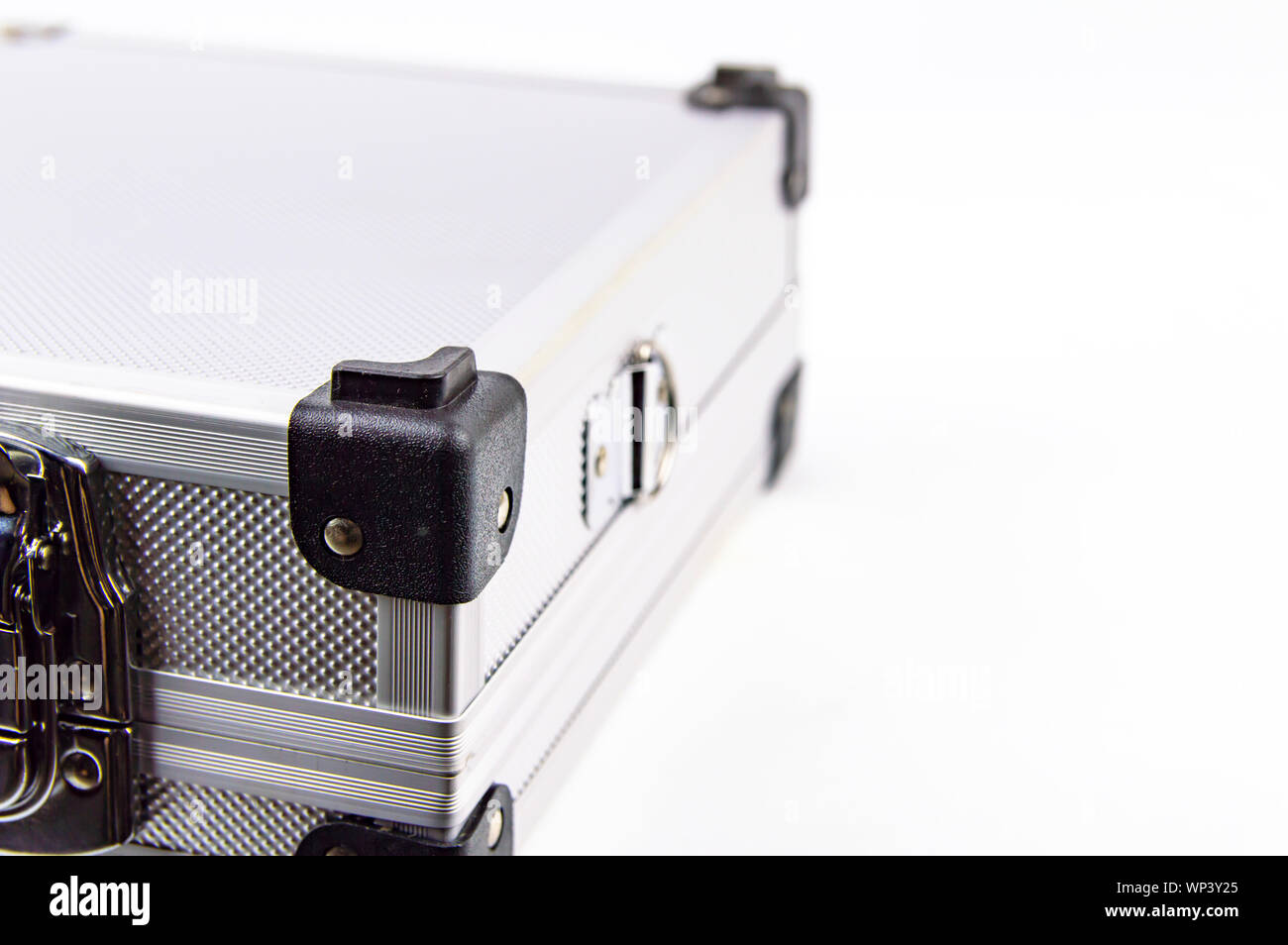 Aluminum case for a working tool on a white background, free space for dext Stock Photo