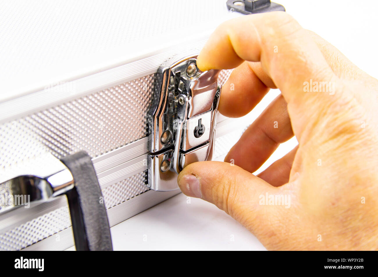 Aluminum case for a working tool on a white background, free space for dext Stock Photo