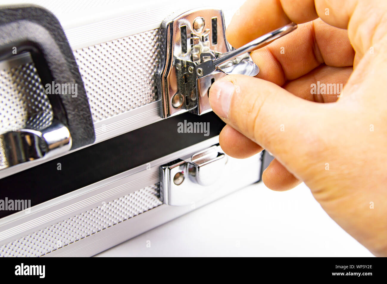 Aluminum case for a working tool on a white background, free space for dext Stock Photo