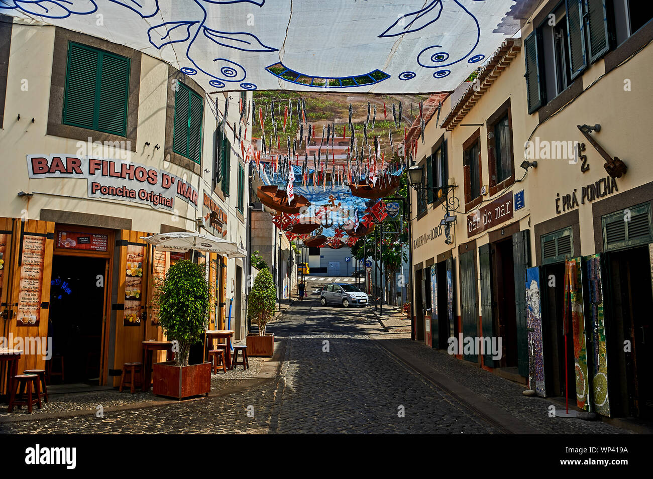 Camara do Lobos, Madeira general street scene with netting and ornate hanging objects Stock Photo