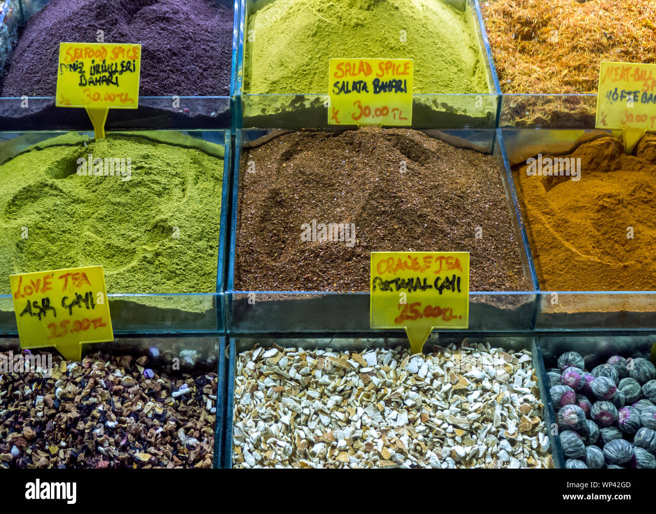 ISTANBUL, TURKEY - MAY 11, 2011 : A colourful variety of spices and teas for sale at a store within the Spice Bazaar in the Eminonu district of Istanb Stock Photo