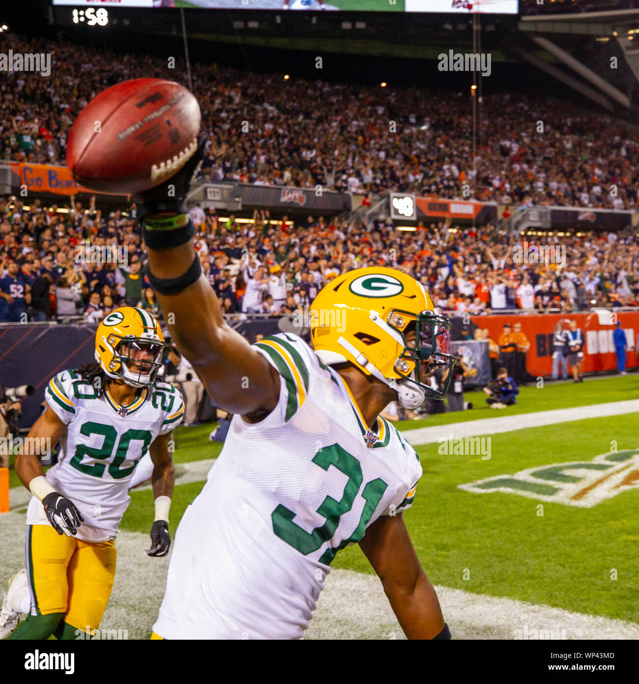 Green Bay, Wisconsin, USA. 12th Dec, 2021. Green Bay Packers safety Adrian  Amos #31 pushes Chicago Bears wide receiver Darnell Mooney #11 out of  bounds during NFL football game between the Chicago