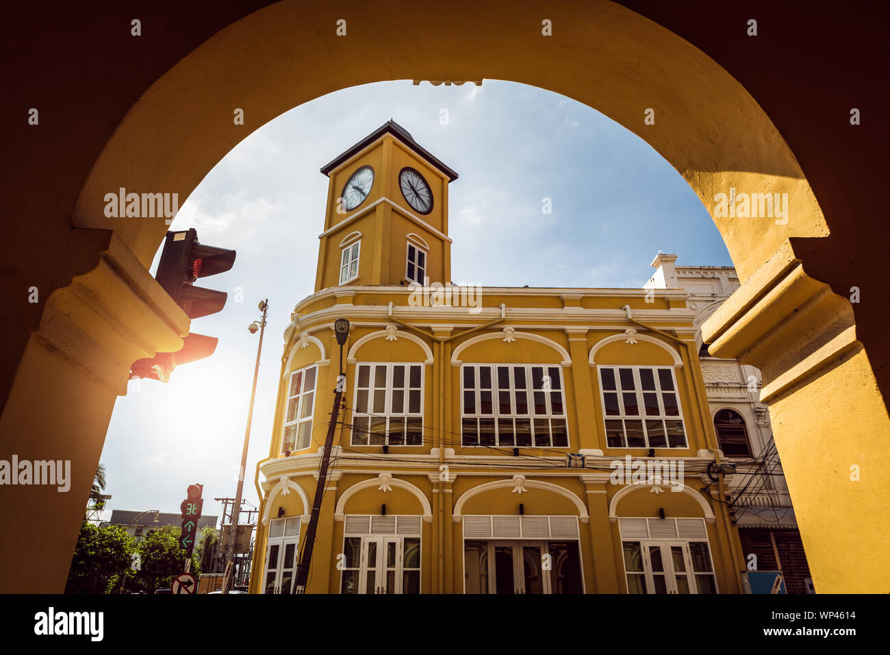 Restored chino-Portuguese clock tower in phuket old town, Thailand. Stock Photo