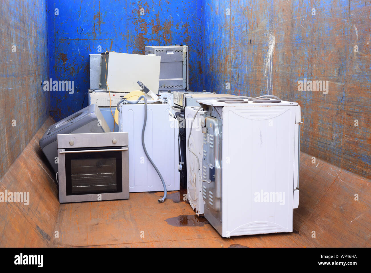 waste electronic and electrical equipment (weee) left for recycling at council household recycling centre united kingdom Stock Photo