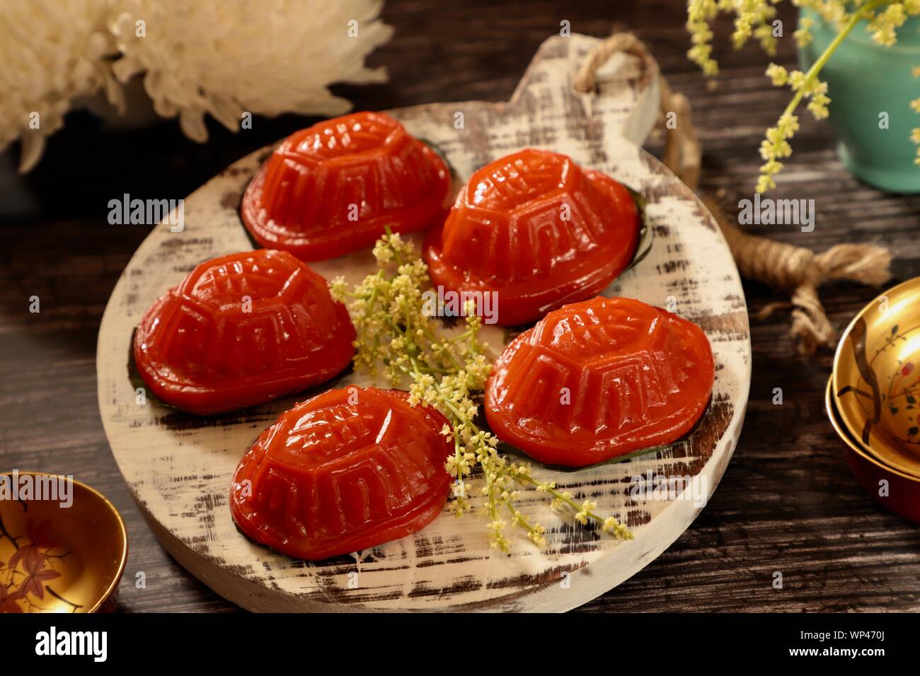 Ang Ku Kueh. Chinese red 'tortoise' cake of sticky rice shell with mung bean filling; popular in China and Southeast Asian countries. Stock Photo