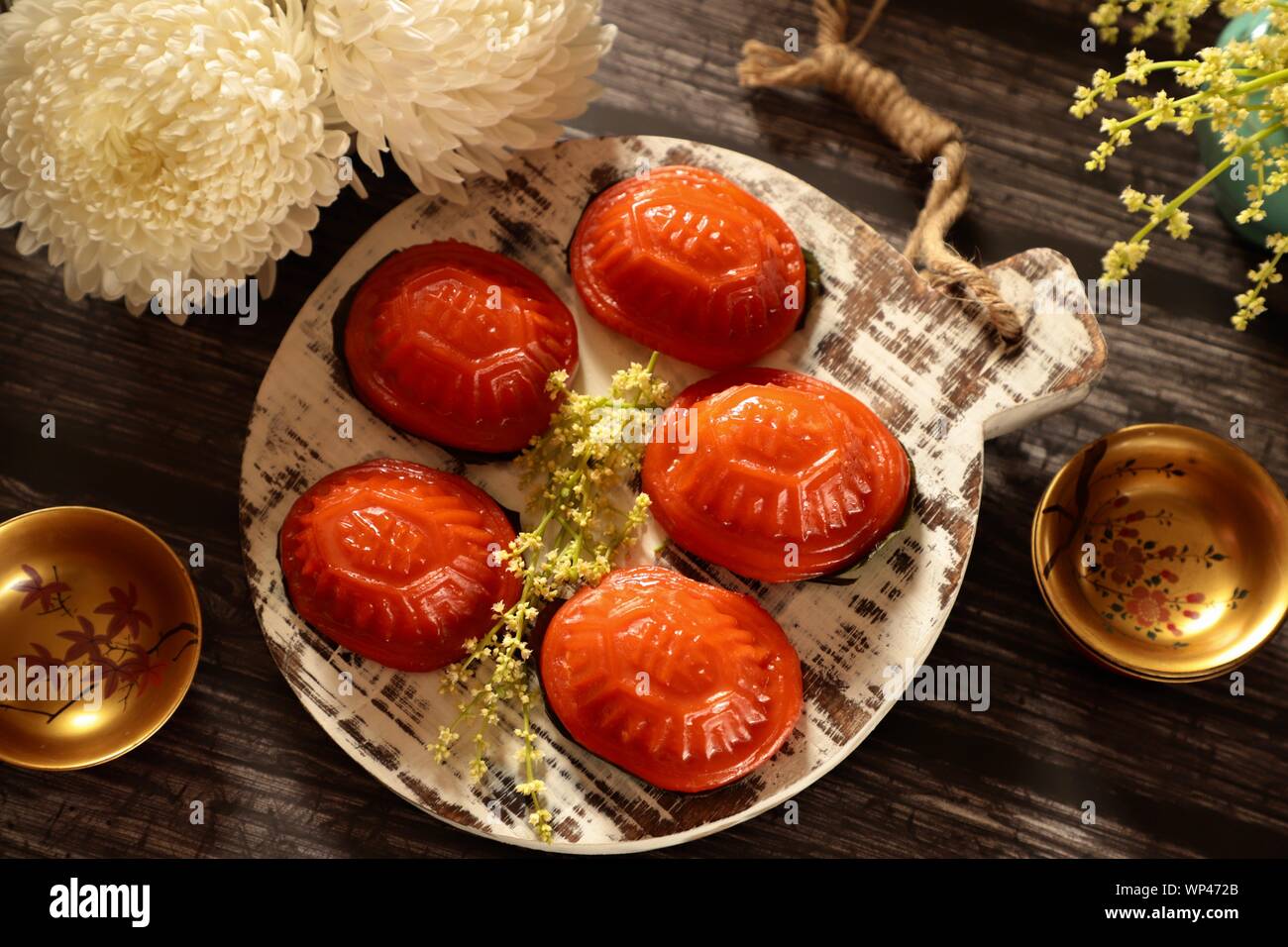 Ang Ku Kueh. Chinese red 'tortoise' cake of sticky rice shell with mung bean filling; popular in China and Southeast Asian countries. Stock Photo