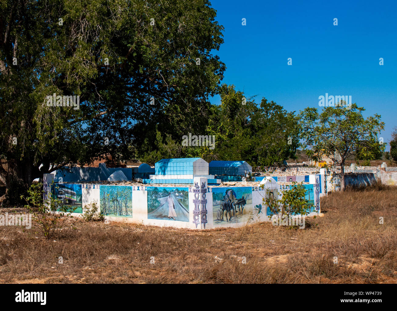 Traditional tomb in a cemetery in south Madagascar,the pictures depict events from the life of the deceased. Stock Photo