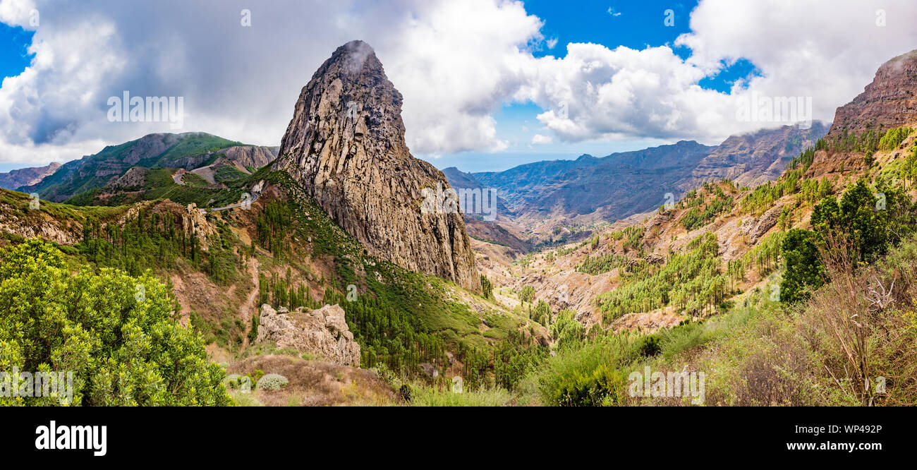 Roque Agando, a dramatic volcanic plug, in the highlands of La Gomera, Canary Islands, Spain.  A symbol of the island and with a Guanche shrine, the o Stock Photo