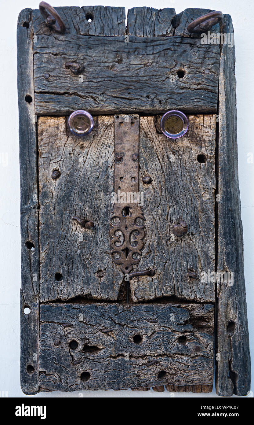 Lanzarote, Spain October 15 2018: Driftwood mask like  face with purple glass eyes, artwork in the  Cesar Manrique Foundation, home ofthe famous artis Stock Photo