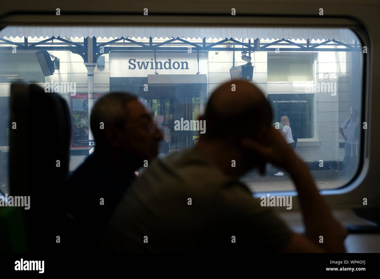 View from a train onto a platform. Stock Photo