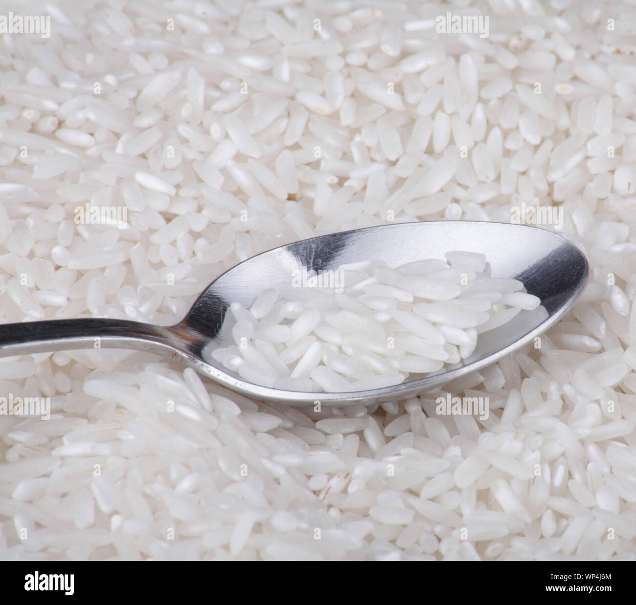 rice food background and teaspoon Stock Photo - Alamy