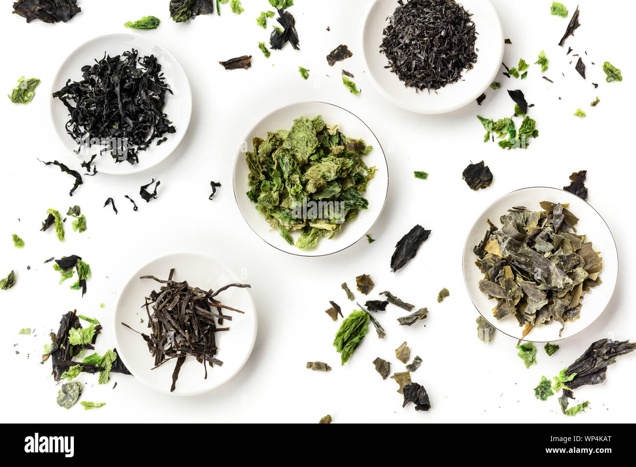 Various dry seaweed, sea vegetables, shot from the top on a white background. Superfoods background Stock Photo
