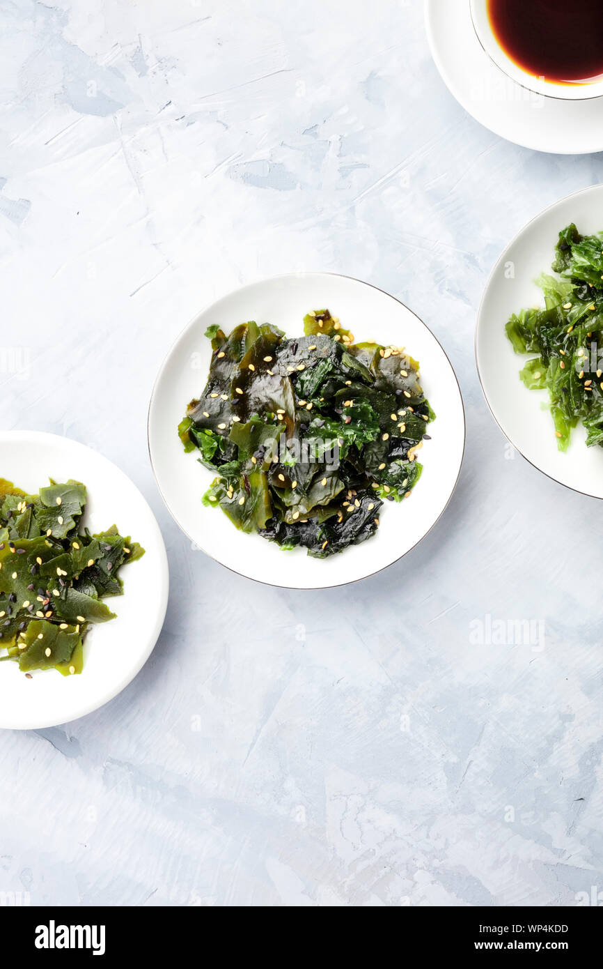 Various seaweed, sea vegetables, shot from the top on with a place for text. Superfoods background Stock Photo