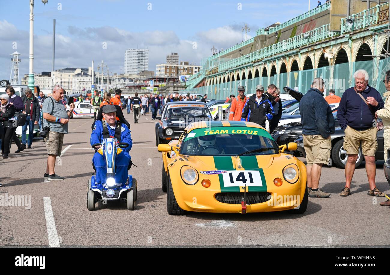 Brighton UK 7th September 2019 - Competitors head to the start to take part in the annual Brighton National Speed Trials along Madeira Drive on the seafront . The event is run by the Brighton and Hove Motor Club and is open to cars and motorcycles old and new with some of the drivers in their eighties as well . Credit : Simon Dack / Alamy Live News Stock Photo