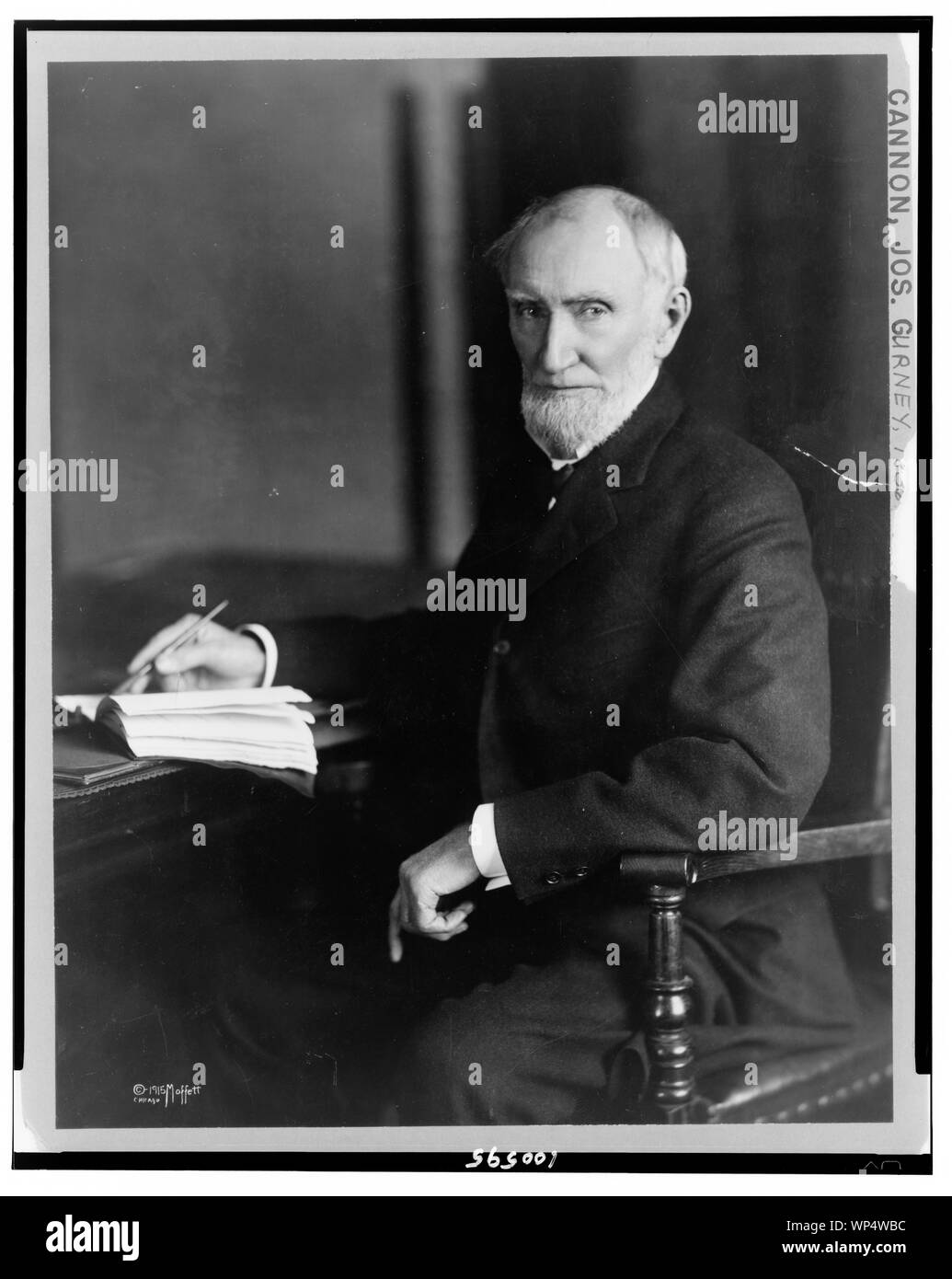 Joseph Gurney Cannon, three-quarter length portrait, seated, facing left Stock Photo
