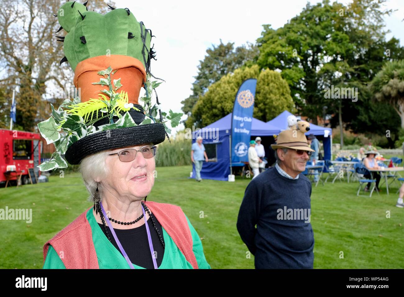 Bridport, Dorset, UK. 7 September 2019. Hat wearers of all types gather and promenade in Bridport. The annual Bridport Hat Festival encourages residents and visitors to take part in hat related activities and and competitions including best hats, best hatted dog, and best hatted couple and most elegant ensemble. Credit: Tom Corban/Alamy Live News Stock Photo