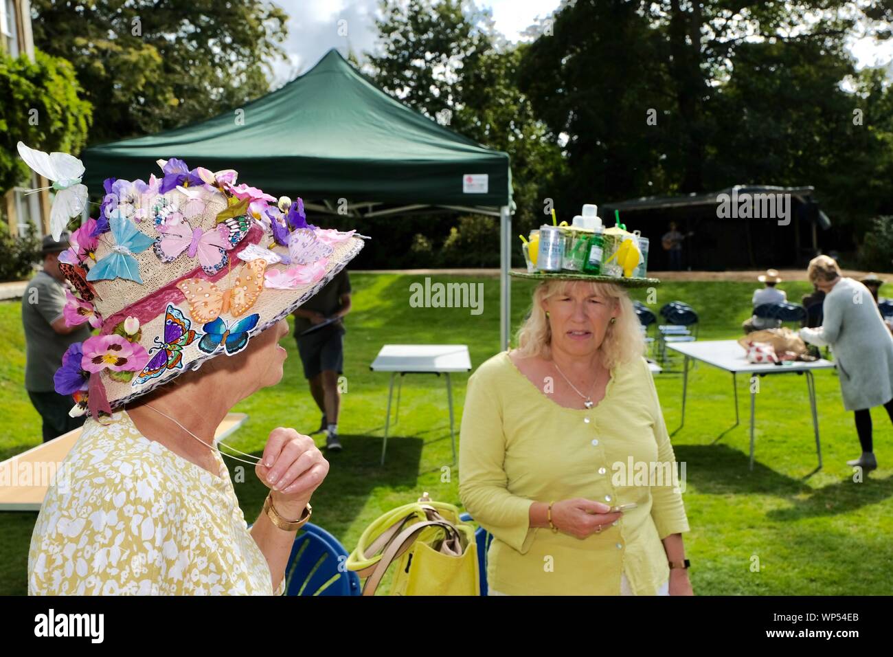 Bridport, Dorset, UK. 7 September 2019. Hat wearers of all types gather and promenade in Bridport. The annual Bridport Hat Festival encourages residents and visitors to take part in hat related activities and and competitions including best hats, best hatted dog, and best hatted couple and most elegant ensemble. Credit: Tom Corban/Alamy Live News Stock Photo