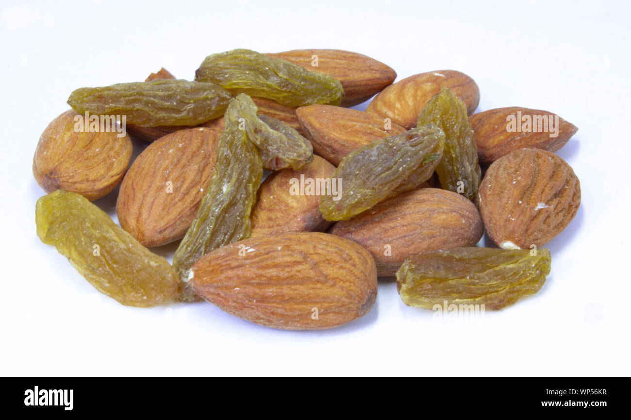 Combination of cashew nuts, almonds nuts and raisins, healthy snack