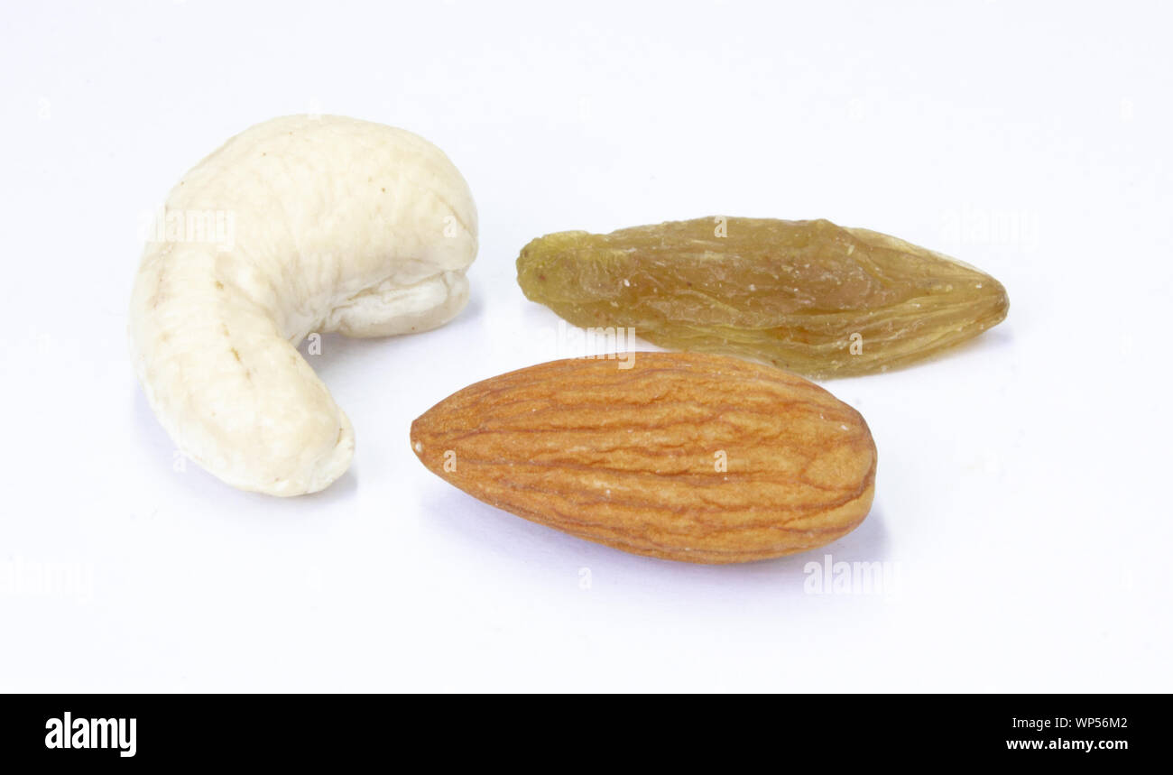 Combination of cashew nuts, almonds nuts and raisins, healthy snack