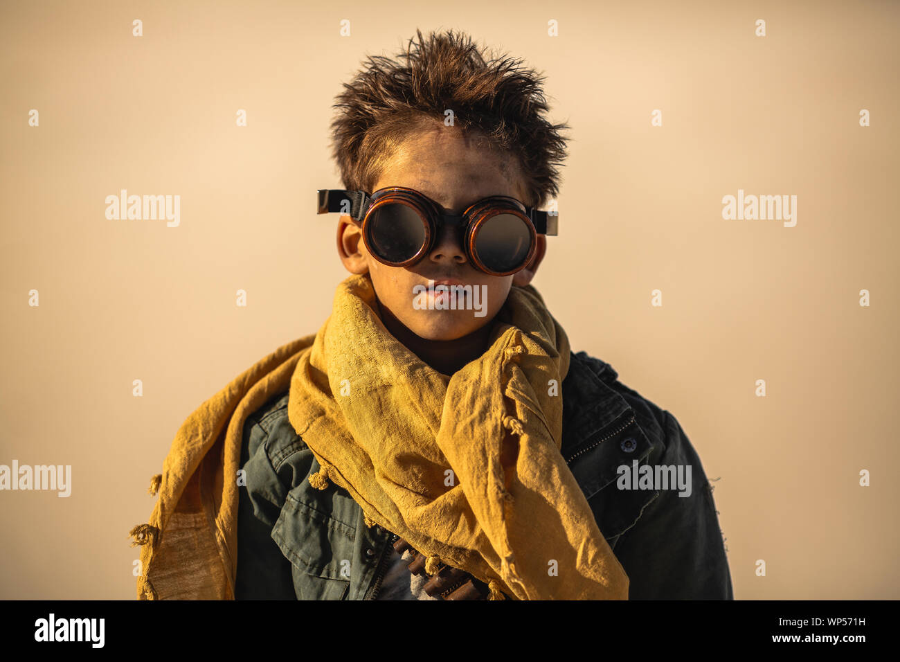 Post apocalyptic boy outdoors in desert Stock Photo Alamy