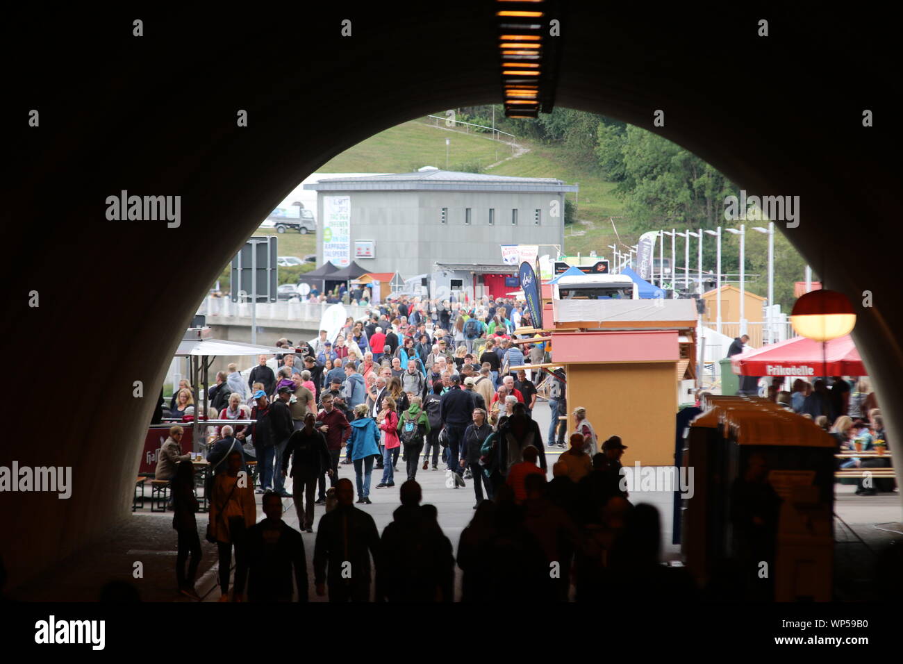 Hasselfelde, Germany. 07th Sep, 2019. Visitors walk along the top of the Rappboden dam wall. The 60th anniversary of the building is celebrated with an open day. Credit: Matthias Bein/dpa-Zentralbild/ZB/dpa/Alamy Live News Stock Photo