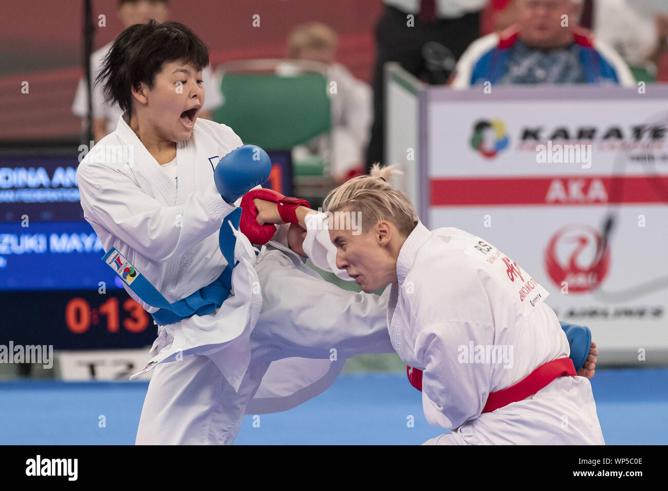 Tokyo, Japan. 7th Sep, 2019. Maya Suzuki of Japan (blue) fights against Anna Rodina of Russian Federation (red) during the Repechage of Female Kumite's -61 kg category at Karate1 Premier League Tokyo 2019. The Karate1 Premier League is held from September 6 to 8 at the Nippon Budokan. The KarateÂ will make its debut appearanceÂ at the Tokyo 2020 Summer Olympic Games. Maya Suzuki won the bout. Credit: Rodrigo Reyes Marin/ZUMA Wire/Alamy Live News Stock Photo
