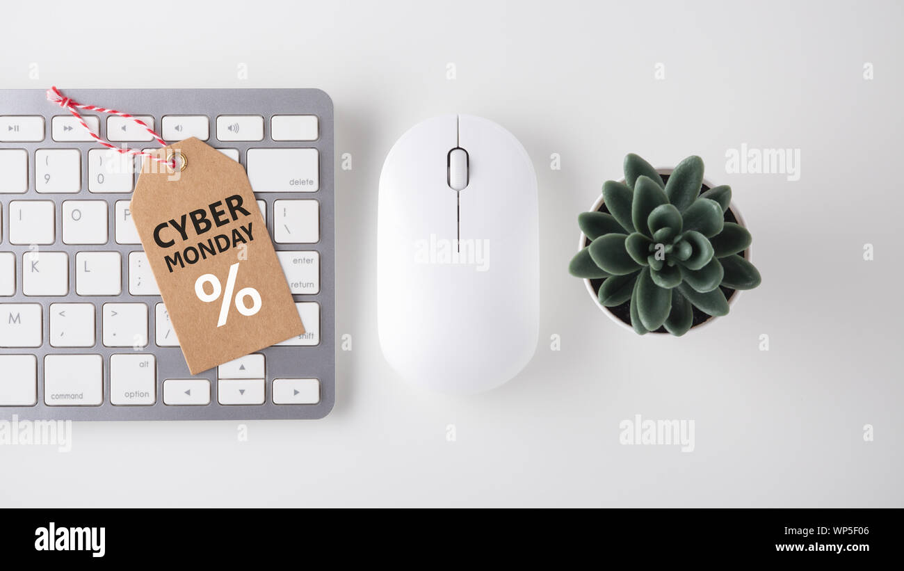 Cyber Monday Sale Concept With Computer Keyboard Mouse On White
