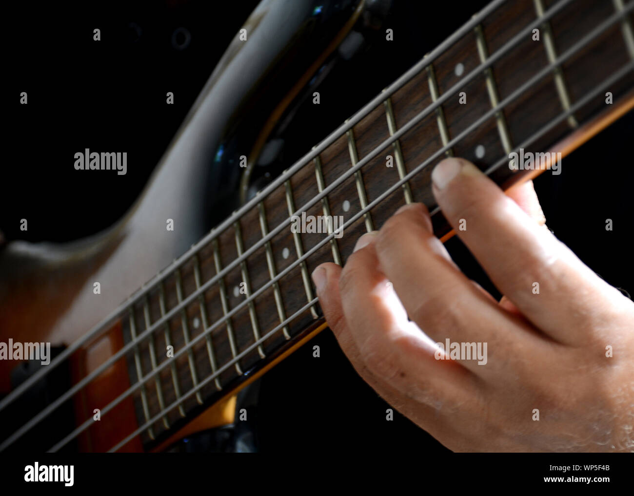 Playing Bass Guitar Stock Photo Alamy