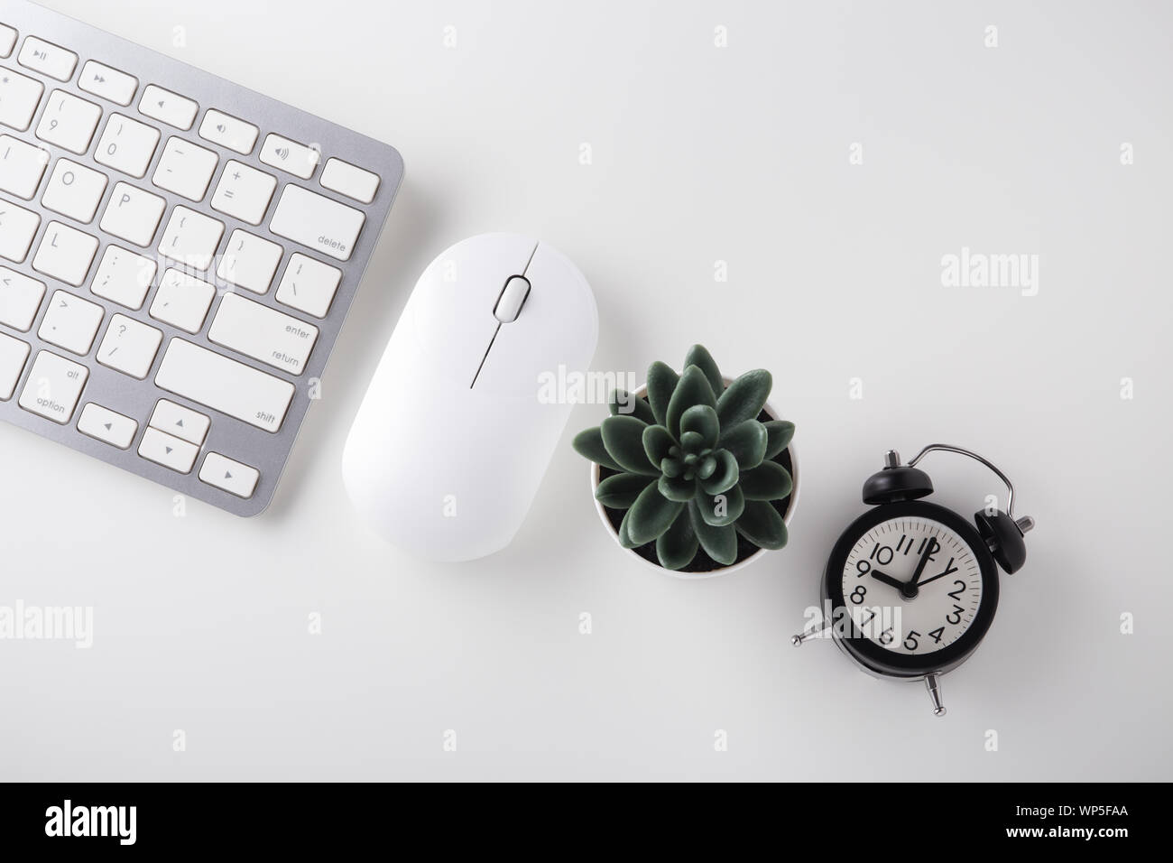 Computer Keyboard Mouse Clock On White Desk Online Sale Cyber