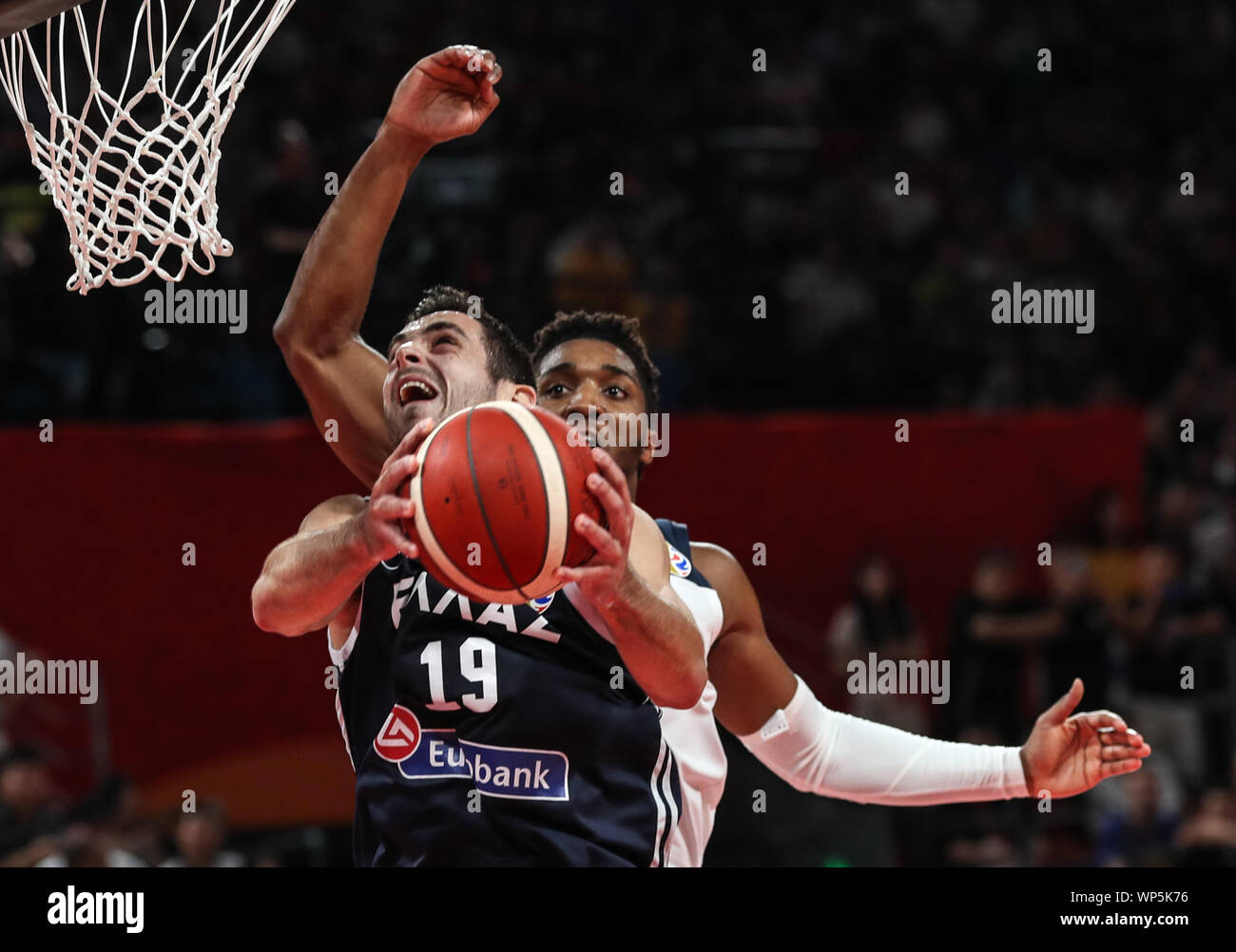 Shenzhen, China's Guangdong Province. 7th Sep, 2019. Ioannis Papapetrou  (front) of Greece goes to the basket during the group K match between the  United States and Greece at the 2019 FIBA World