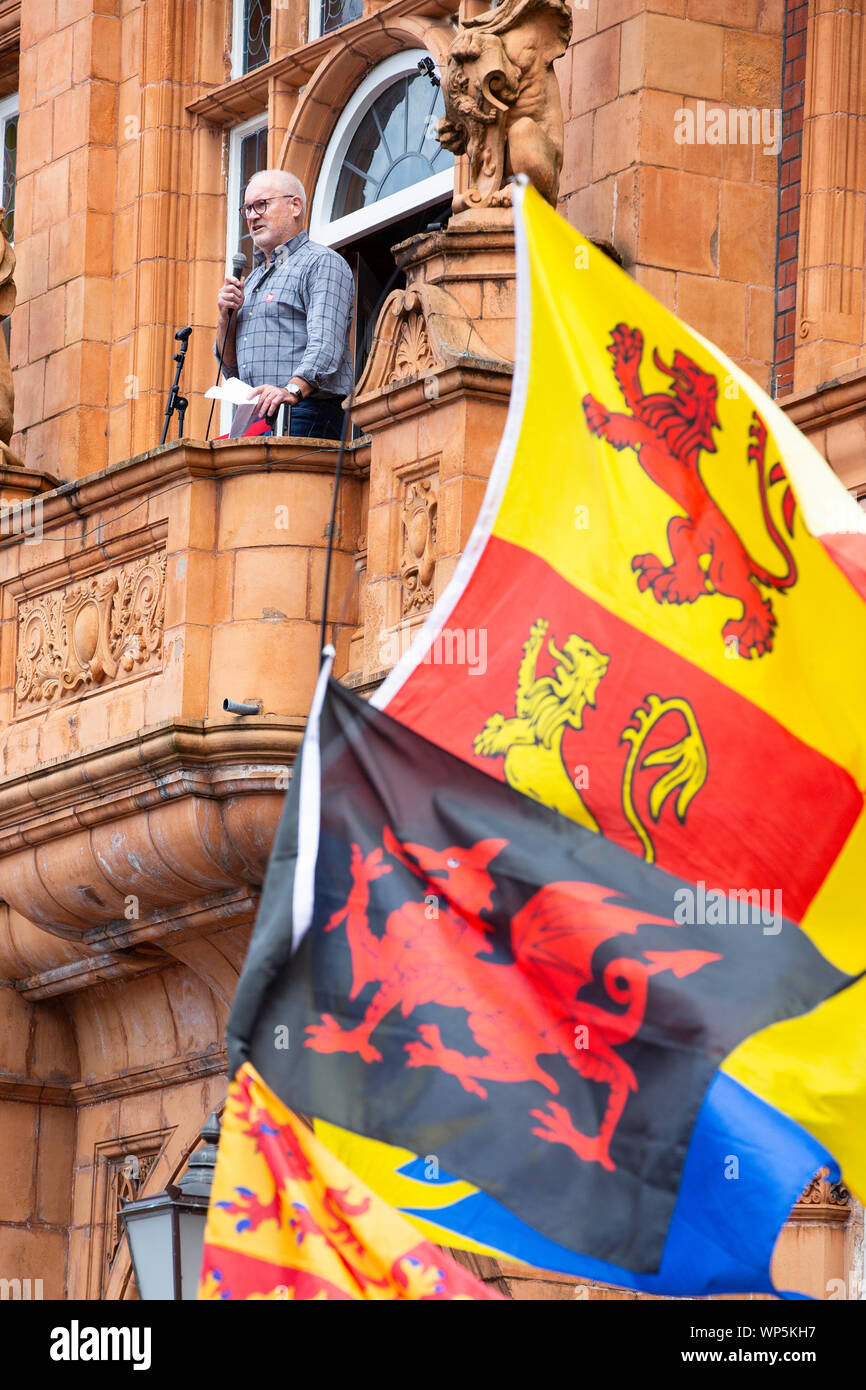 Merthyr Tydfil,  Wales, UK. 7 September 2019.  Rugby commentator and former Welsh rugby captain Eddie Butler addresses the crowd at the March for Welsh Independence in Merthyr Tudful. Stock Photo
