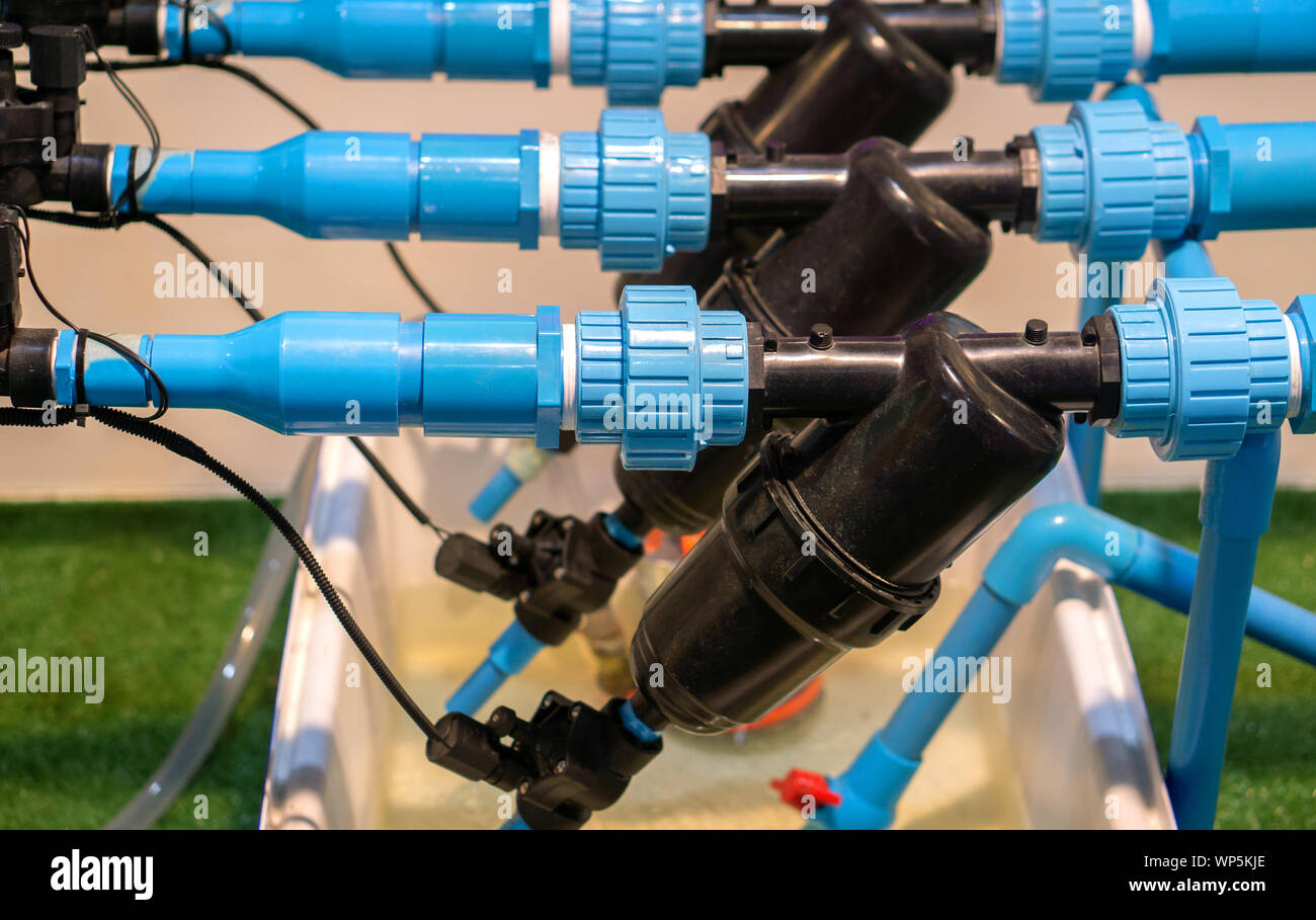 Modern agricultural water pipes that help make farming easier Stock