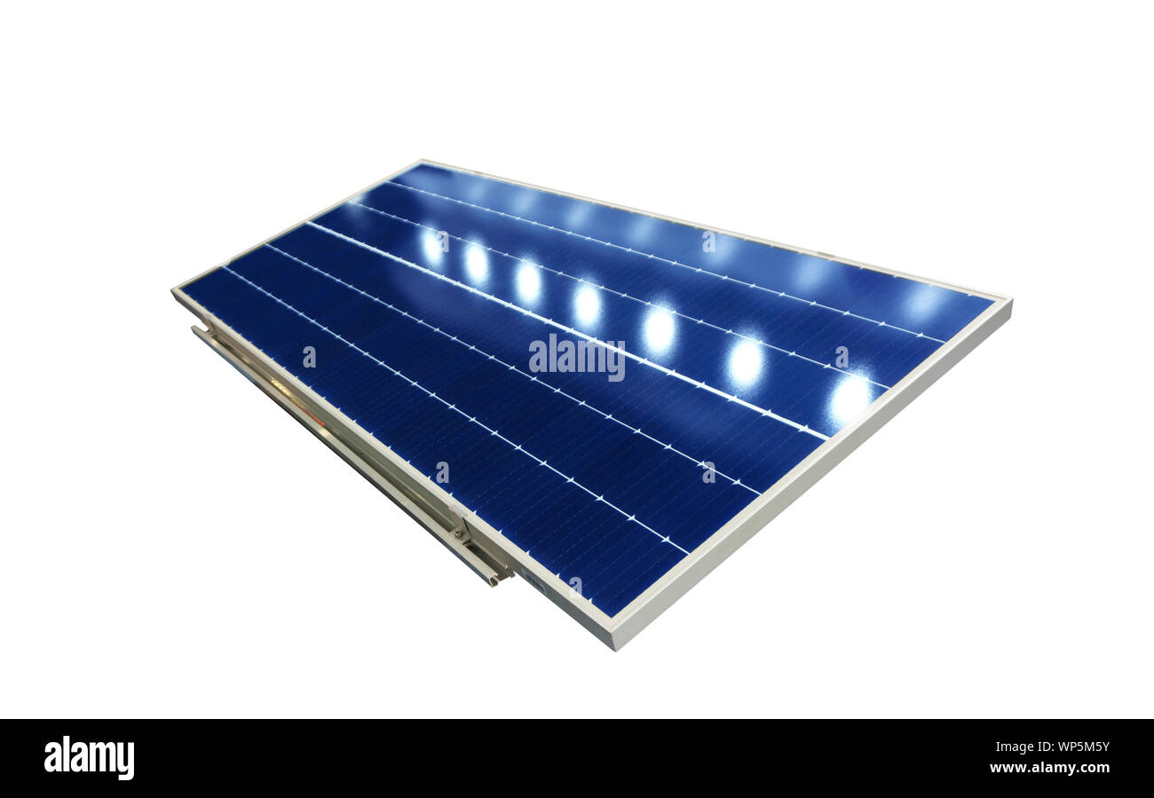 Photovoltaic solar panels absorb sunlight as a source of energy to generate direct current electricity. Stock Photo