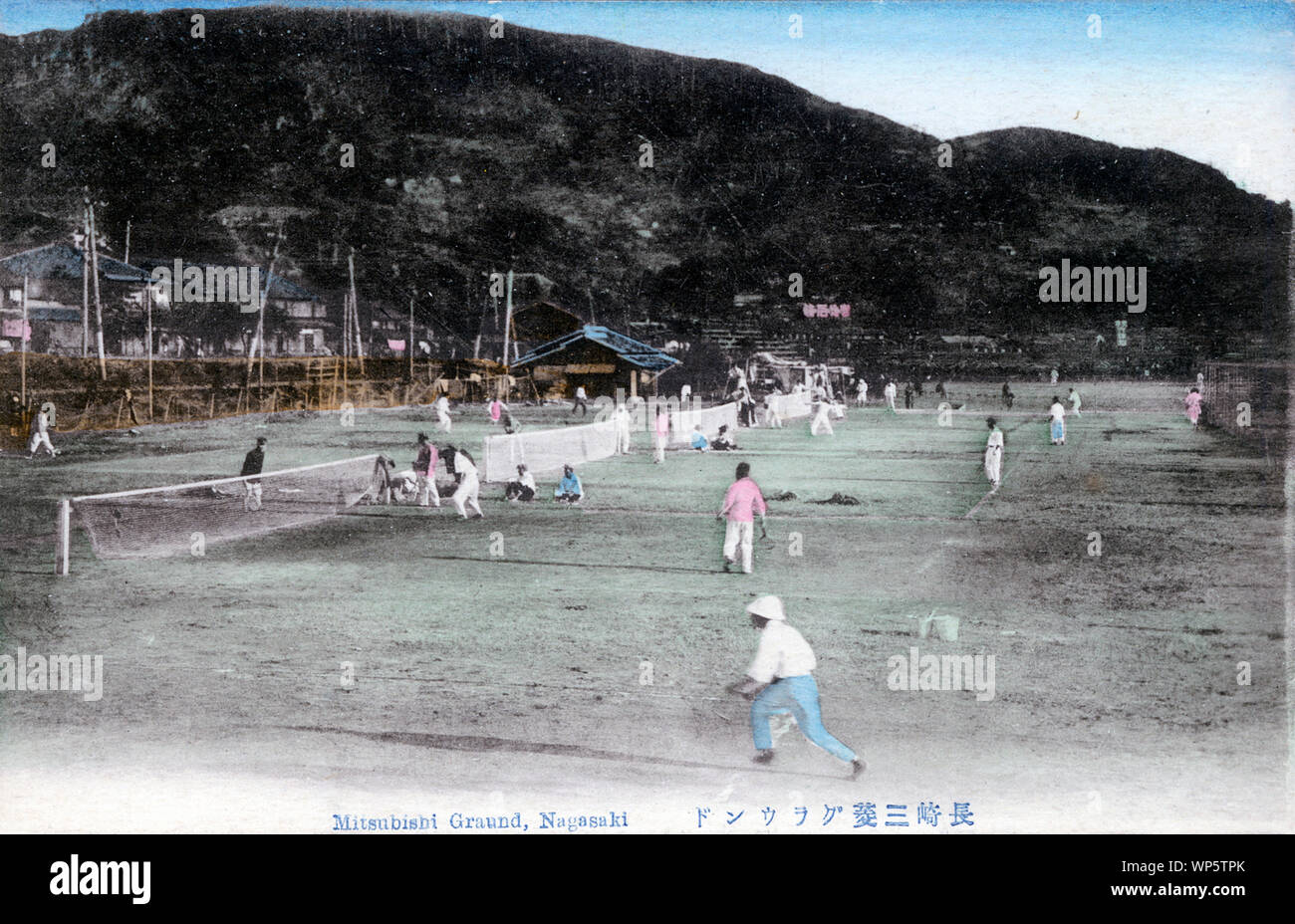[ 1910s Japan - Tennis Courts in Nagasaki ] —   Tennis courts at Mitsubishi Ground in Nagasaki.  20th century vintage postcard. Stock Photo