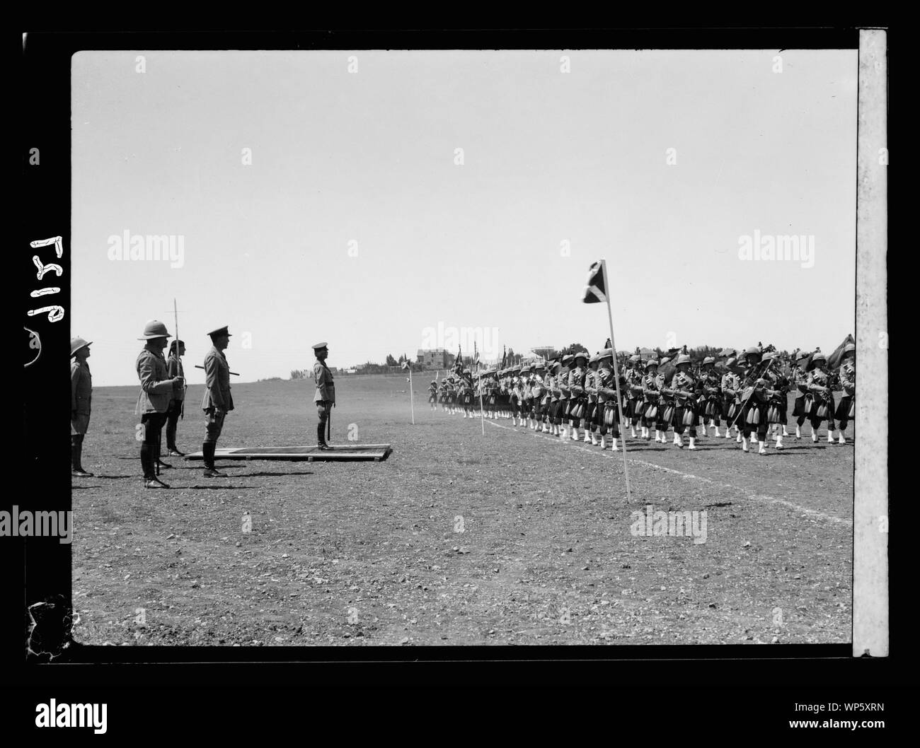 King's birthday celebration. The March Pass salute taken by H.E. (i.e