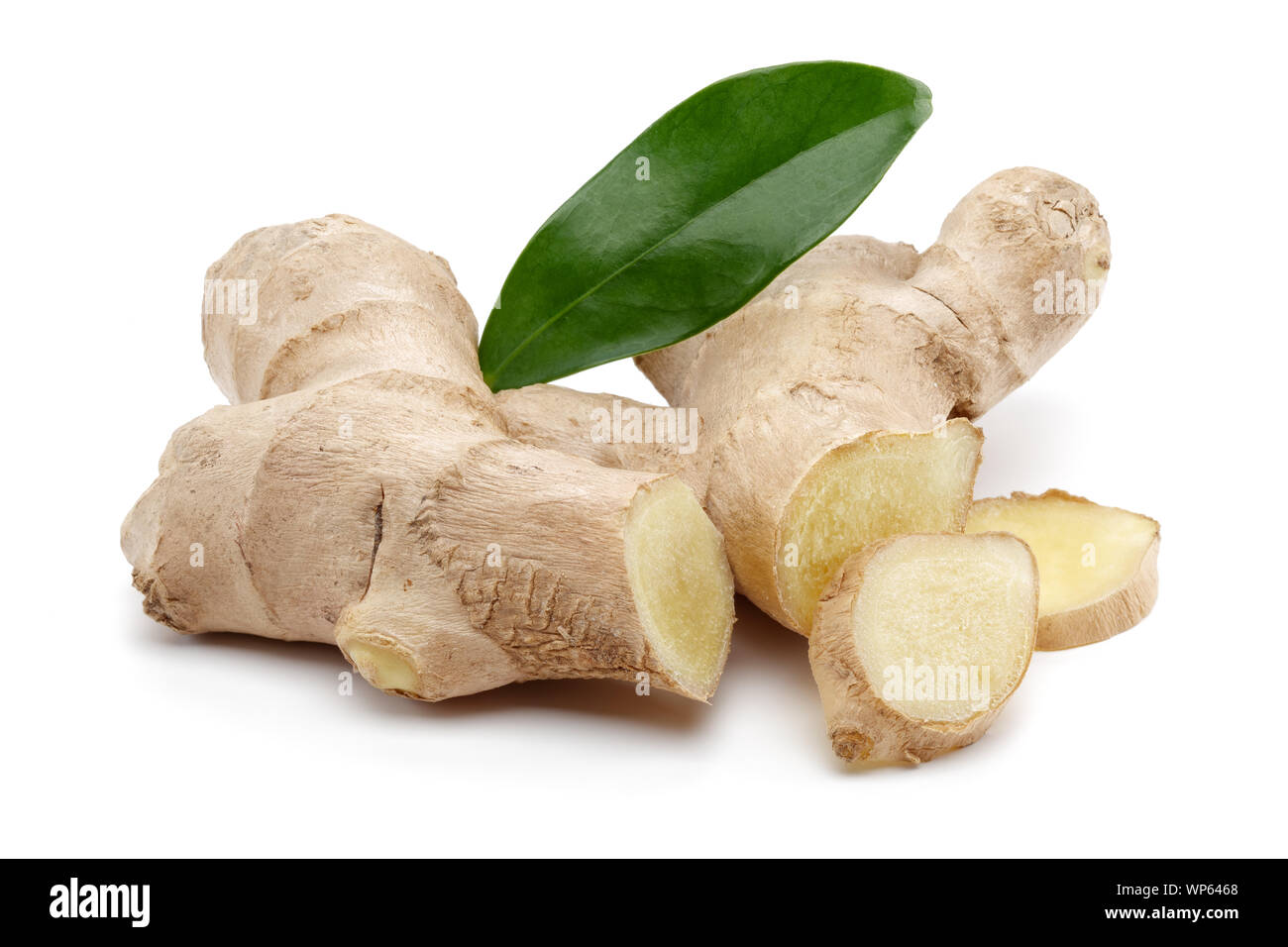 Fresh ginger root with slices and leaf isolated on white background Stock Photo