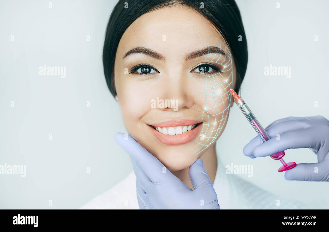 Portrait asian woman with lifting lines , showing face lift concept. Save youthful skin with lifting injection Stock Photo