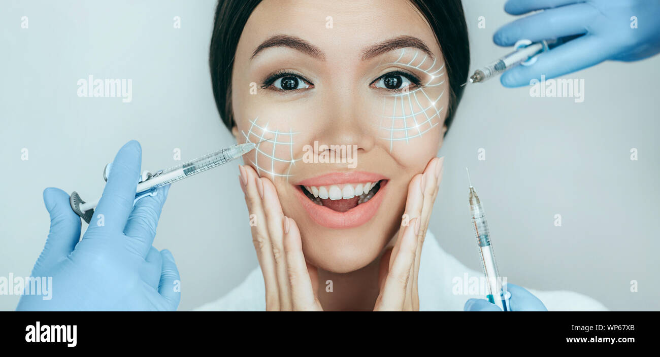 Portrait of amazing female face with lifting lines , showing face lift concept. Save youthful skin with injection Stock Photo