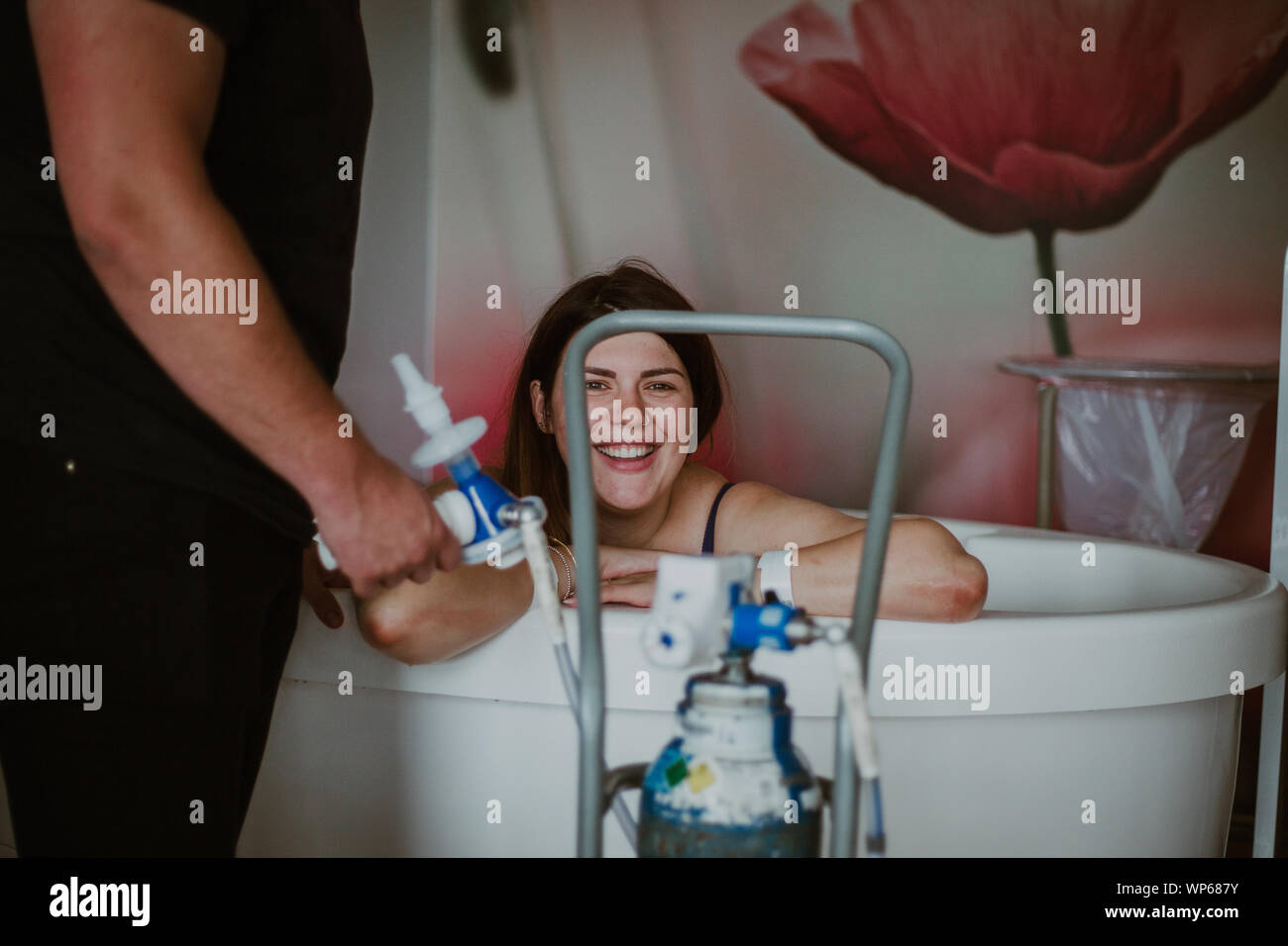 Authentic birth images, woman giving birth in pool Stock Photo Alamy