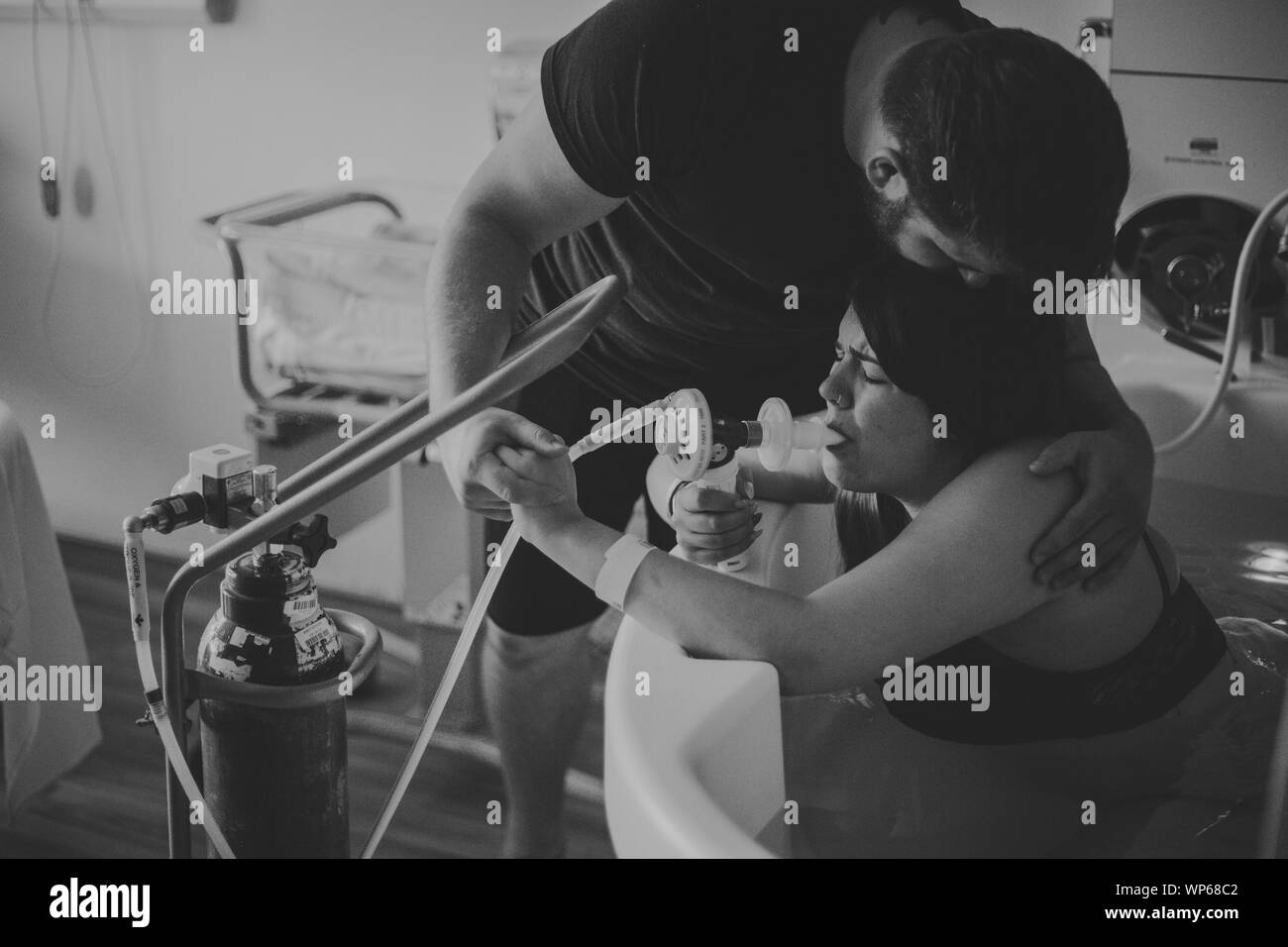 Authentic birth images, woman giving birth in pool Stock Photo Alamy